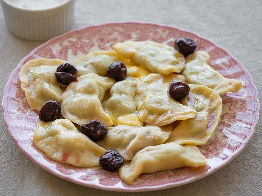 Ukrainian Sour Cherry Dumplings (Varenyky) by annavoloshyna.com